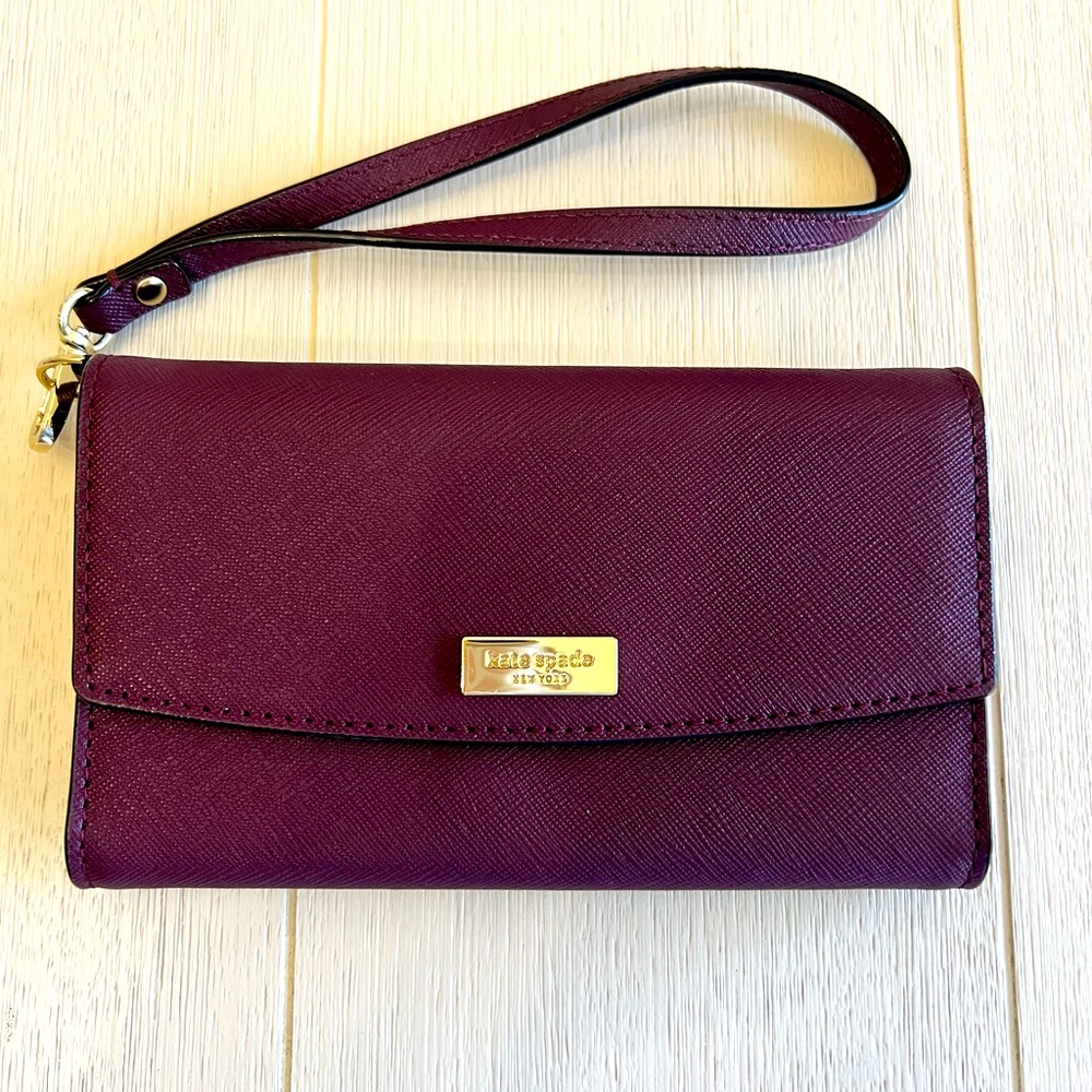 Kate Spade Laurel Way Winni wristlet wallet in deep plum